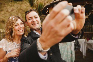 bride and groom selfie at the tunnels ilfracombe