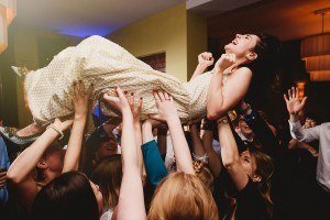bride crowdsurfing goldbrick house