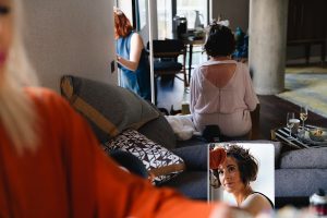 A woman sits on a couch