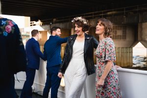 A smiling bride in a white dress